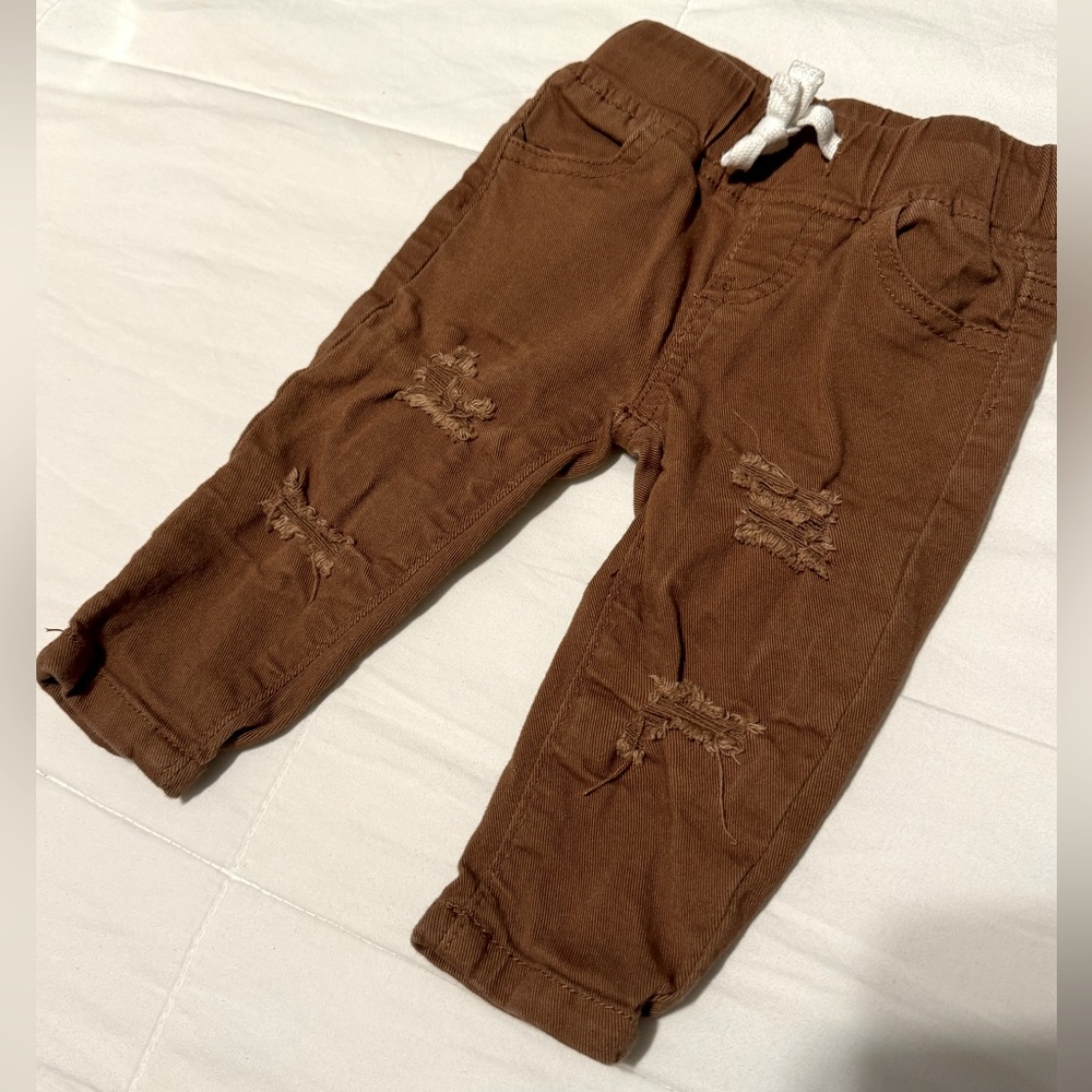 *Olive & Scout*  “ripped” brown jeans